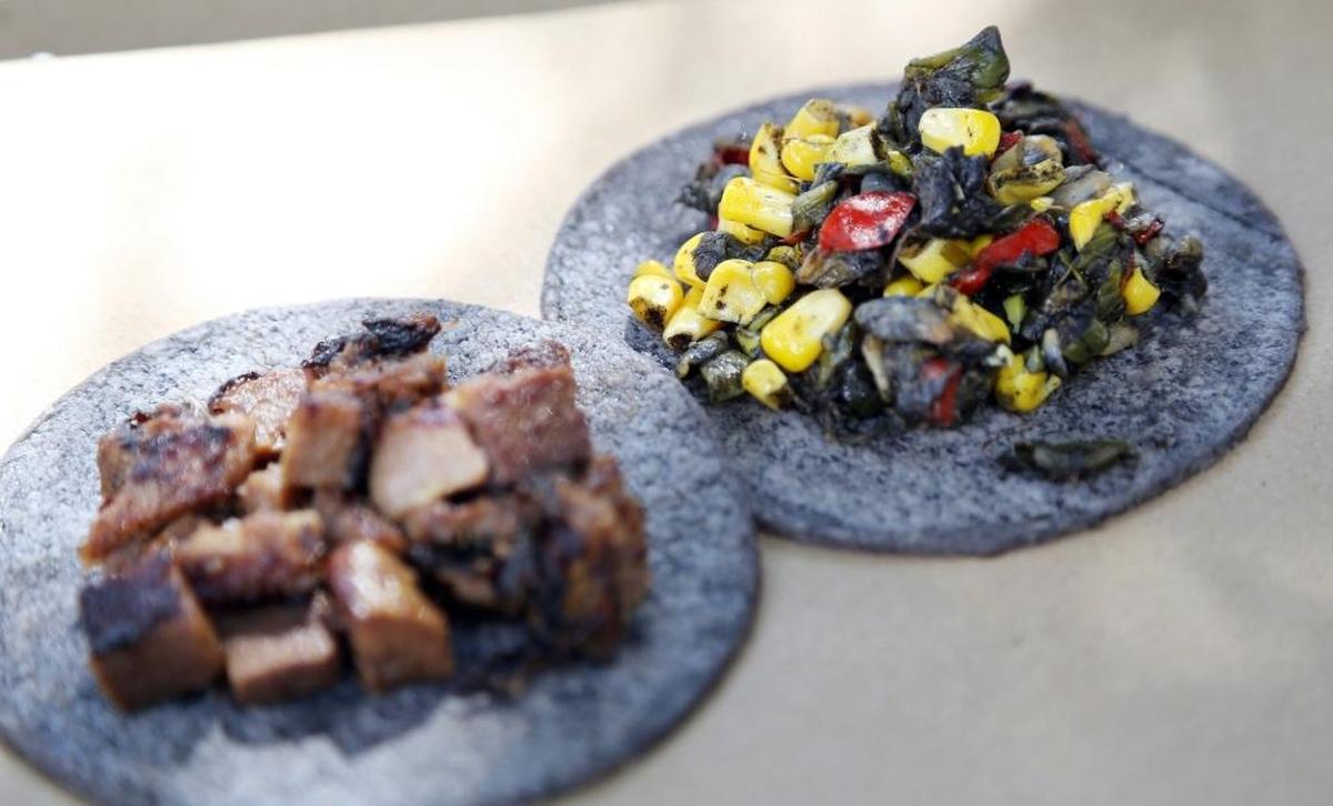 Tacos at Taquiza come with the famous blue corn tortillas.