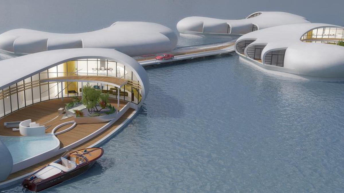 Diseño de varias casas flotantes de la empresas New Living on Water, que pueden conectarse a tierra mediante un muelle y estar intereconectadas.