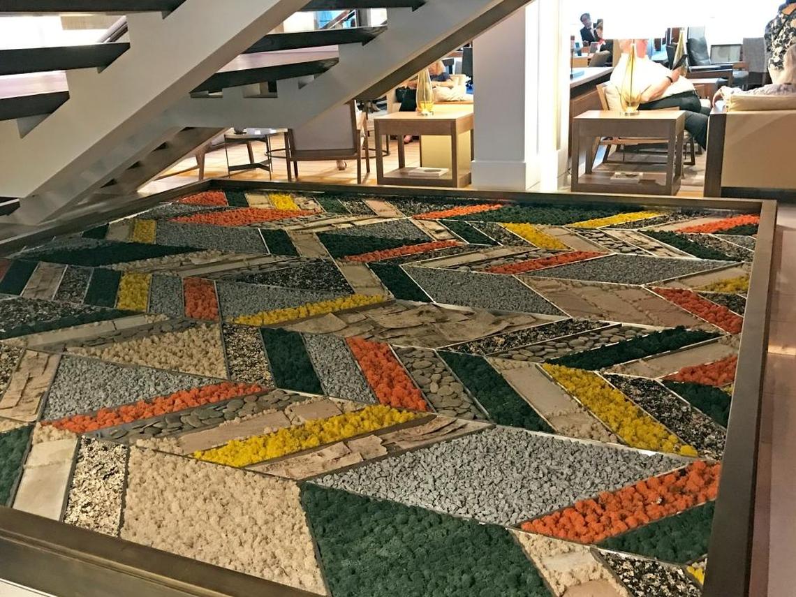 A Nordic touch: a lichen garden under the stairs in the atrium of Viking Sun.