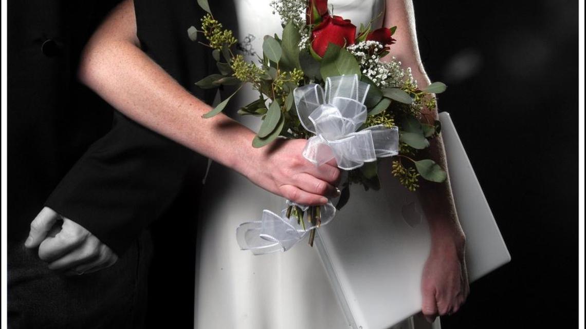 A bride holds a bouquet