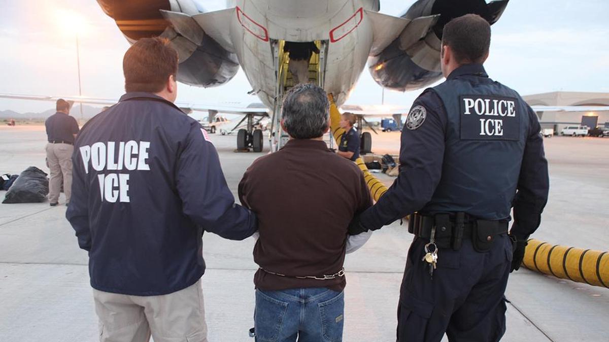 ICE deporting a Guatemalan national in 2011. 
